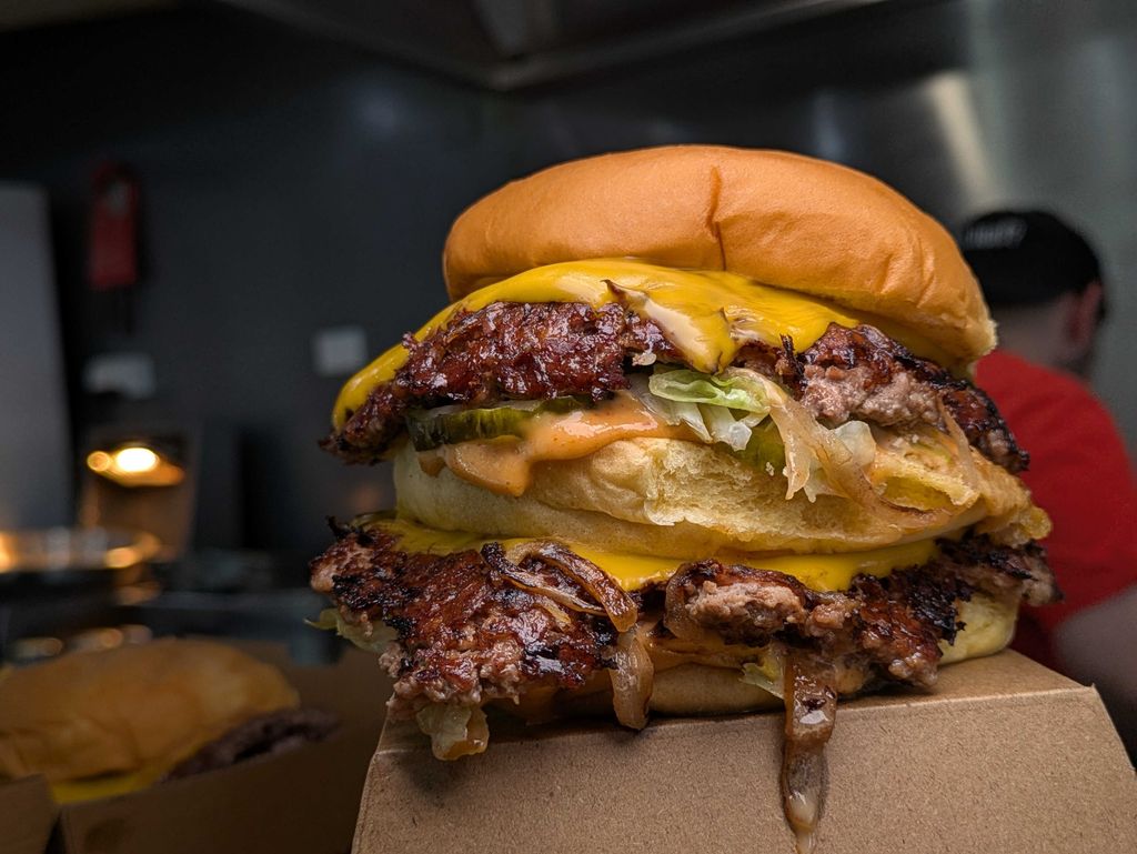 Burger kitchen with local butcher setup